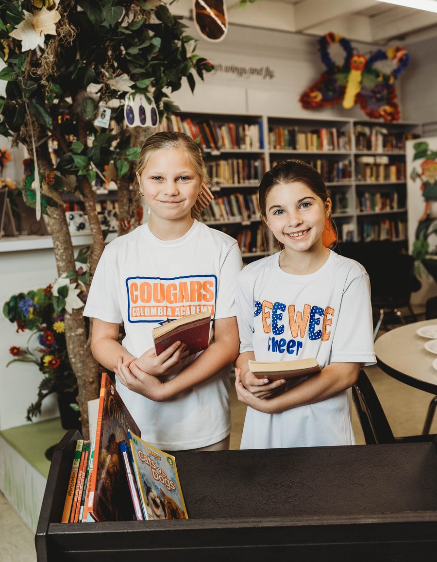 Columbia Academy students reading in the school library